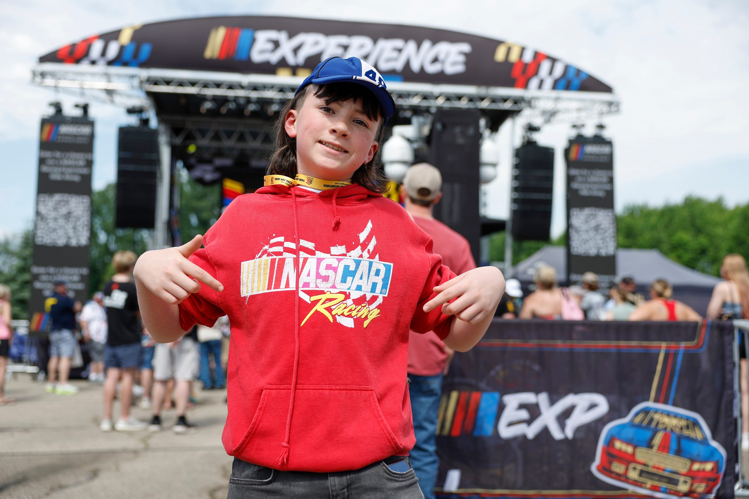Fans enjoying NASCAR racing action at MIS